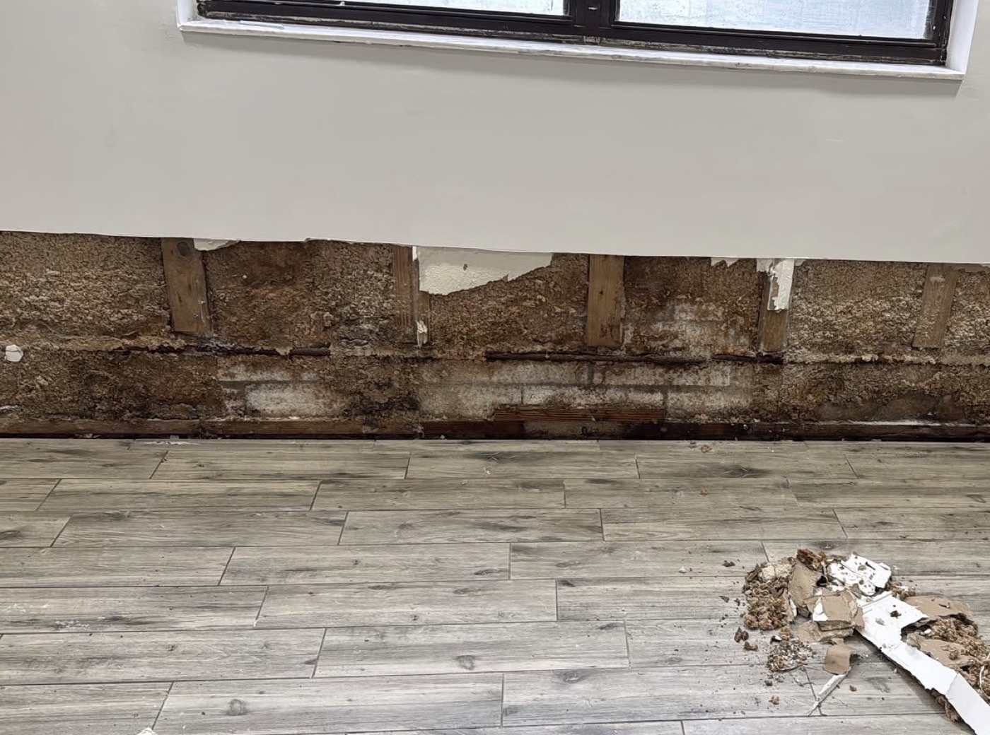 Drywall damage before repair